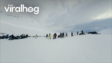 Competitor Crashes At Snowmachine Hill Climb || ViralHog