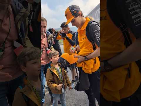 Oscar making a fan's day on arrival 
