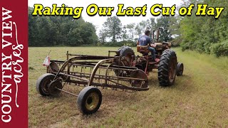 Raking our Last cut of hay. Trying a different way.