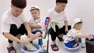 Dad Looks At Phone And Keeps Wiping His Son's Feet!#fatherlove  #cutebaby#funny#family#funny videos