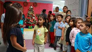 City of Laredo Employees give Christmas gifts to students at Heights Elementary School
