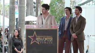 Jonas Brothers give shout-out to wives, parents while getting their Walk of Fame star