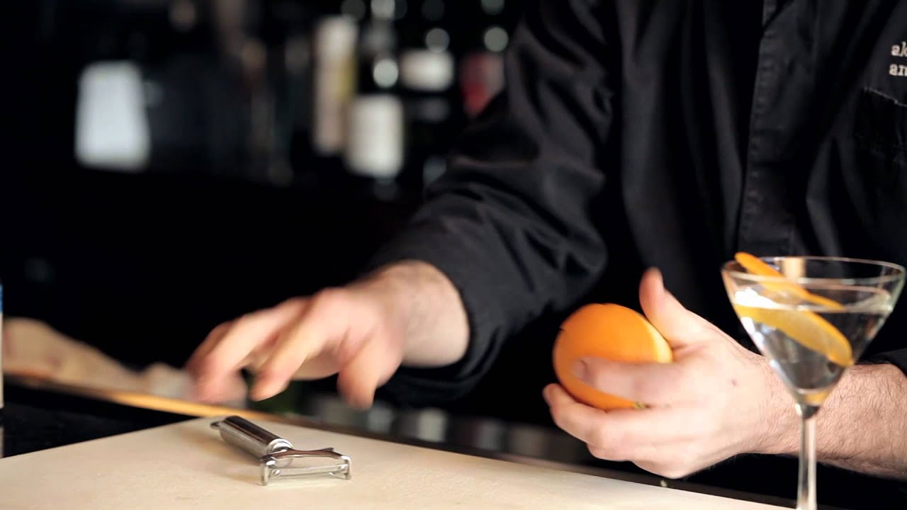 How to use a Peeler for Cocktail Garnishes - DrinkSkool Bar Techniques 