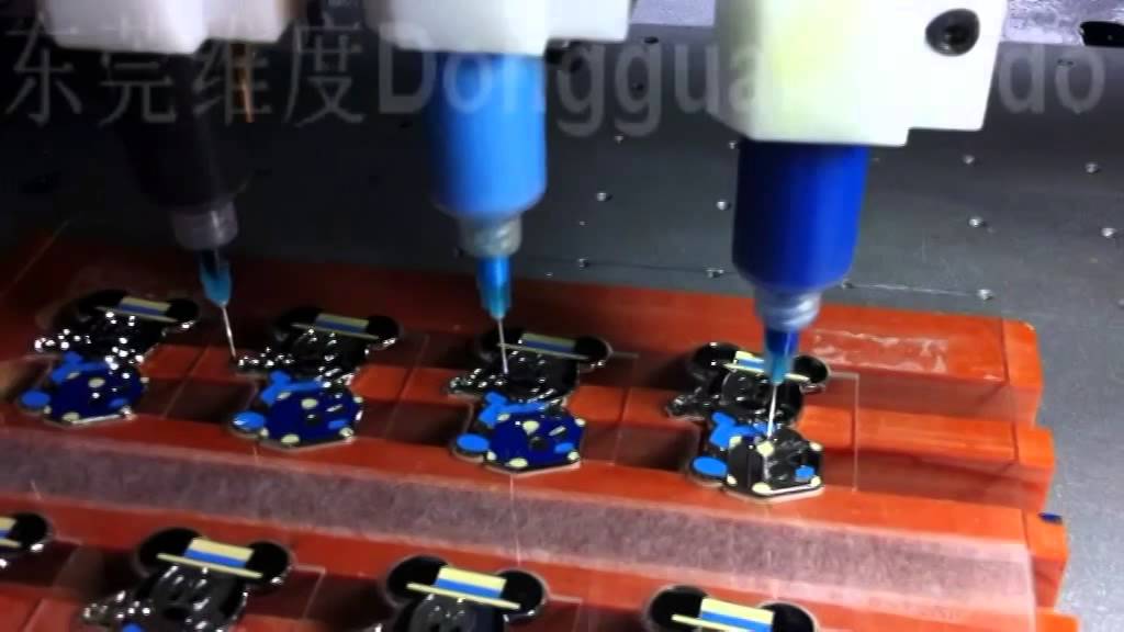 Weldo enamel dispensing machine Mikey Mouse color injection processing ...