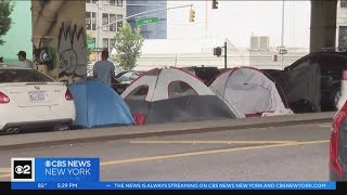 City workers dismantle asylum seekers encampment under the BQE