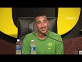 The Oregon Ducks football team speaks with the media