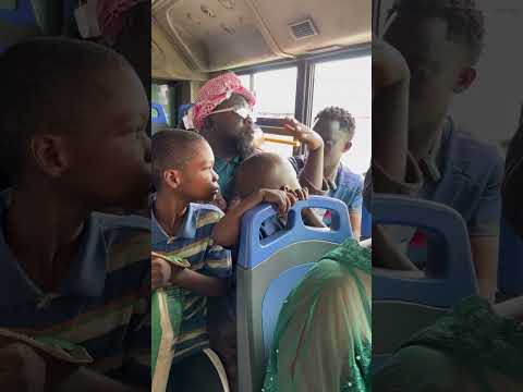 The woman with plenty kids in the bus