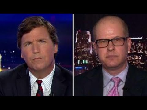 Tucker vs critic who calls him cheerleader for Russia