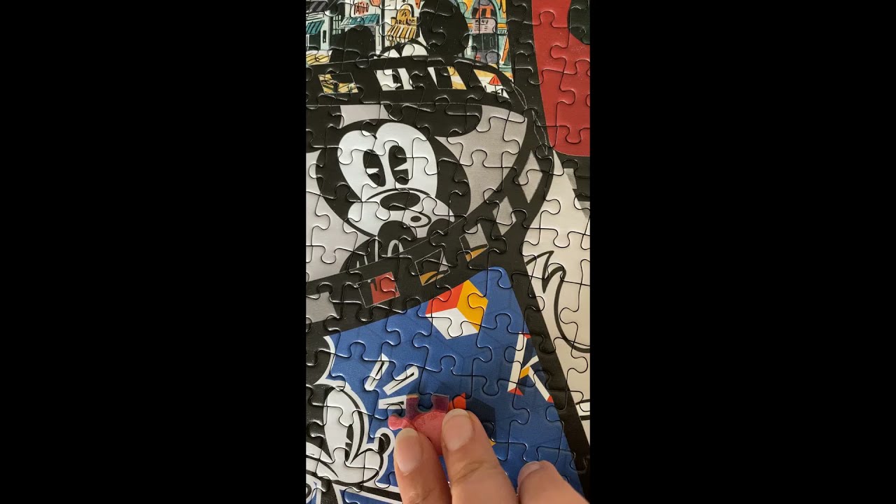 Mickey Mouse the true original 90years of magic jigsaw by Jumbo. Last piece satisfaction