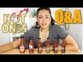 *IT BURNS* Answering luxury questions whilst trying HOT SAUCES!