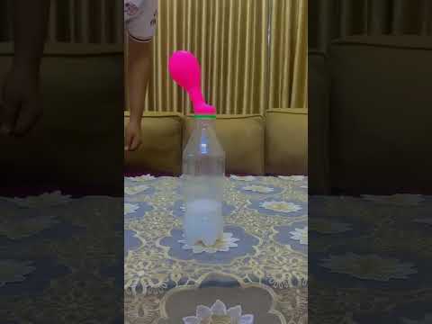 تفاعل حمض الخليك مع بيكربونات الصوديوم