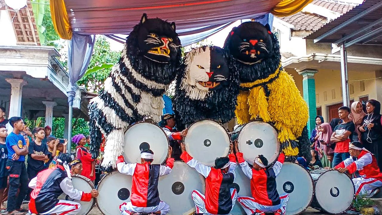 ATRAKSI CAN MACANAN SINGO MANGGALA DAN DRUMBAND MAONG REMAS  DI JAMBIANOM JAMBISARI PART 1