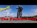 Mountain biking across Blackstone edge on the Pennine Way
