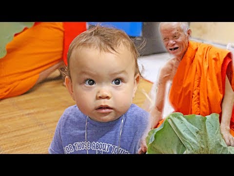 baby's-first-haircut-by-a-monk-in-thailand