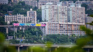 WATCH THIS Train Literally Drives Through Apartments Liziba Chongqing