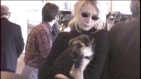 GWYNETH PALTROW brings puppy to airport