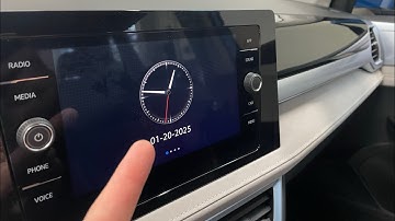 How to set the clock on a 2025 VW Taos