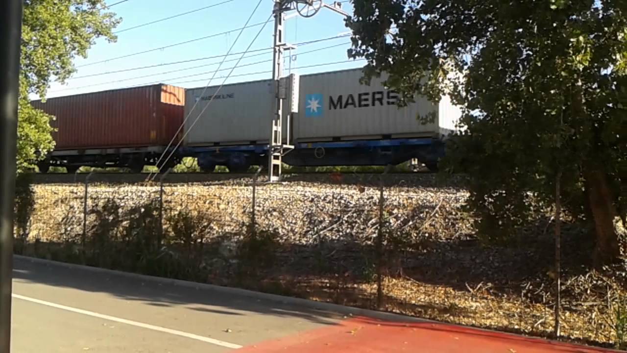 Freight train between Barcelona and Tarragona passing Las Palmeras
