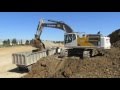 Volvo ec480e loading trucks