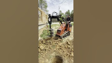 Digging holes for the porch posts #diy #logcabin #cabinbuilding