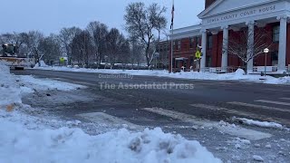 Snow blankets streets in Lowville, New York, county sheriff issues travel advisory