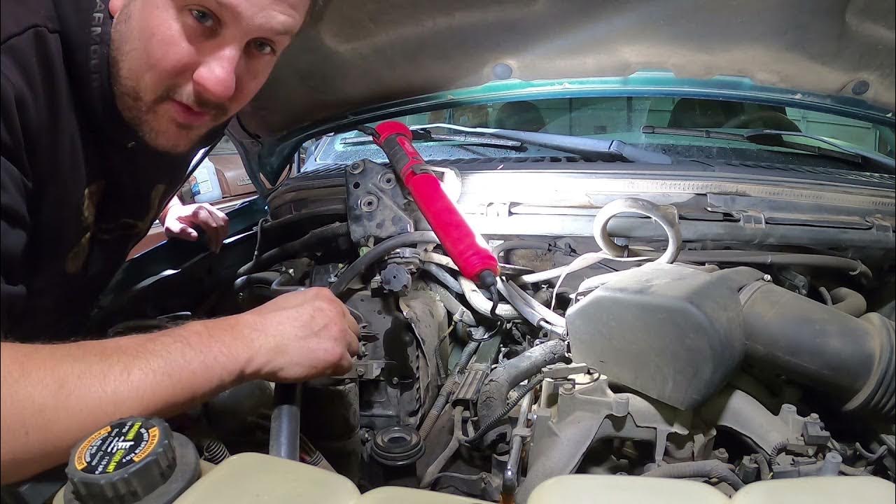 1999 f250 v10 spark plug BLOWOUT FIX YouTube