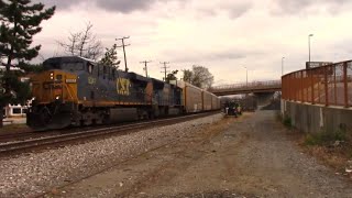 CSX  Q217-20  with SD70AC  trailing  meets  W751 at west hyattsville 04/08