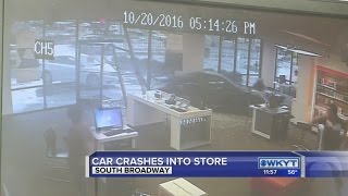 Car goes through Lexington AT&T store; hits woman