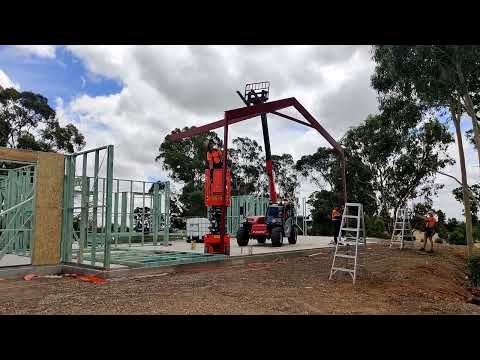 Installing the Steel Portal - Lifting 900kg with a Manitou Telehandler lifting to its maximum height