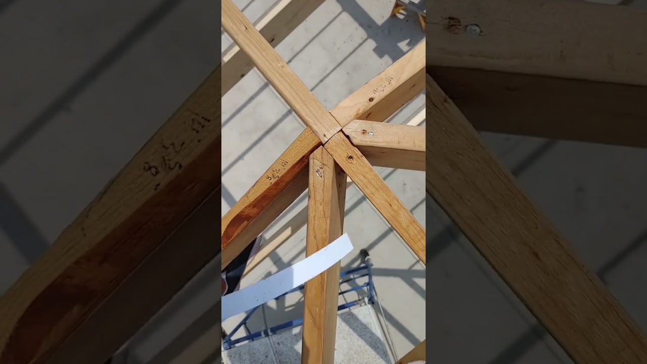 Hand-framing a roof: expert techniques and precision