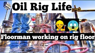 Drilling Rig Floor , Floorman Working Pullout Of Hole.oil Rig Life