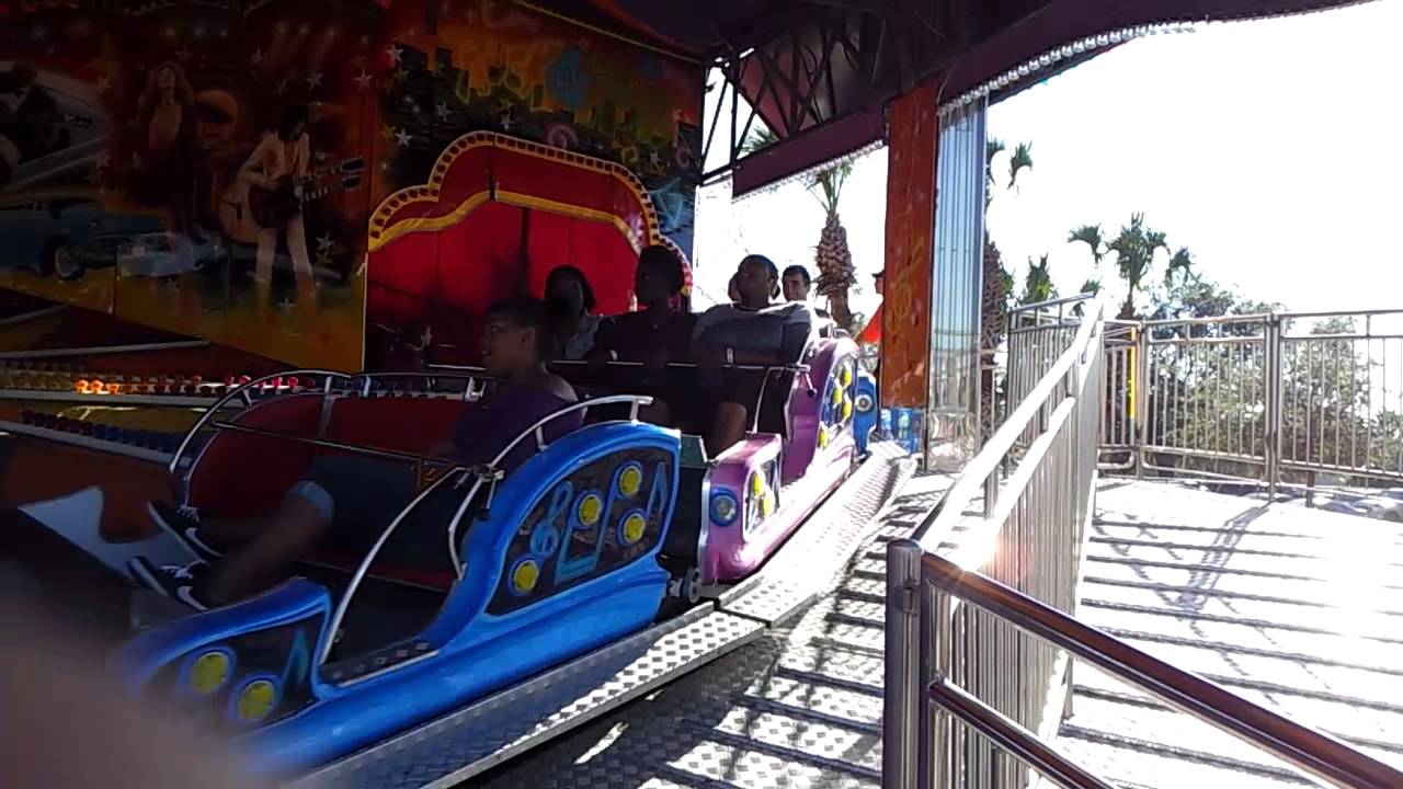 Audrey on the Rock and Roll ride at the fair - YouTube