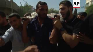 Mourners attend funeral of man killed in clashes
