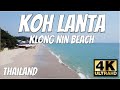 Tranquil stroll along klong nin beach koh lanta  serenity on thailands shores