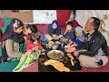 Twin children living underground cooking local in a cave