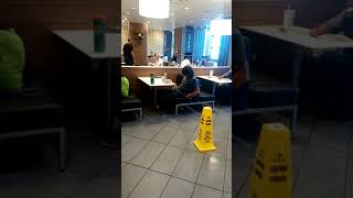 Guy taking a nap at McDonald's in Edmonton gets a wake up call by staff