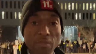 ICE protesters gather outside One Government Center in downtown Toledo Thursday