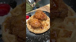 The FRIED CHICKEN & WAFFLES from The Grotto BK in Brooklyn, NYC are incredible! 🍗🧇 #DEVOURPOWER