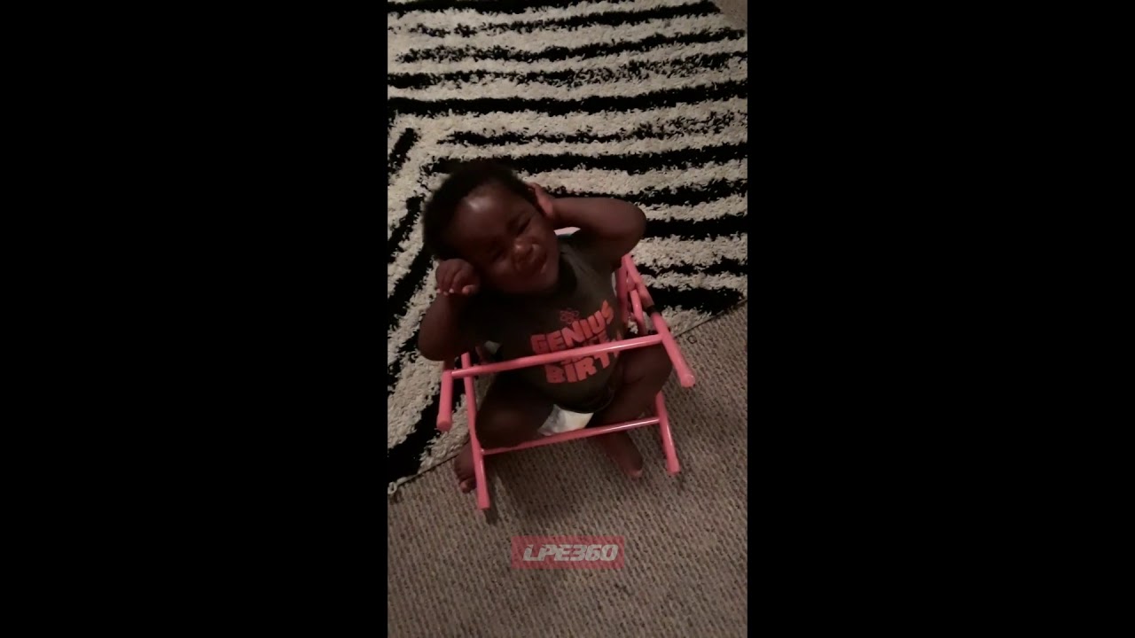Kid stuck in a chair - YouTube