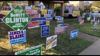 A yard fillwd with almost 60 political signs is an art installation