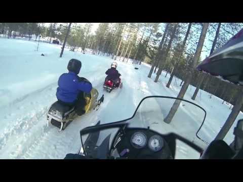 Arctic Circle Snowmobile Park: Children snowmobiling Santa Claus Village Rovaniemi Lapland Finland