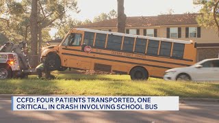 Crash involving school bus leaves four hospitalized