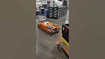 AGV robot towing pallets through the plant! 🤖 #shorts #reels #robot #robots #fyp #autonomy #foryou