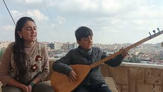 Stranek Nû Bi Dengê Rojvan Û Fehîma, Bi Alîkariya Mamoste Welîd Canyar. Diyarî Gelê Efrînê Dikin.