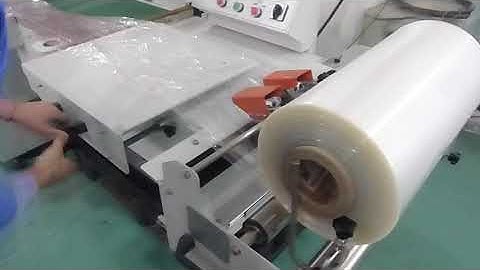 semi-auto L bar sealing shrink wrapping machine working video