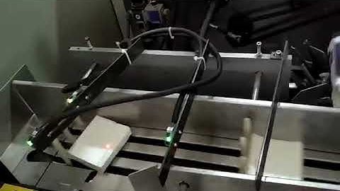 Full automatic box facial tissue packing machine, side putting tissue paper packaging machine