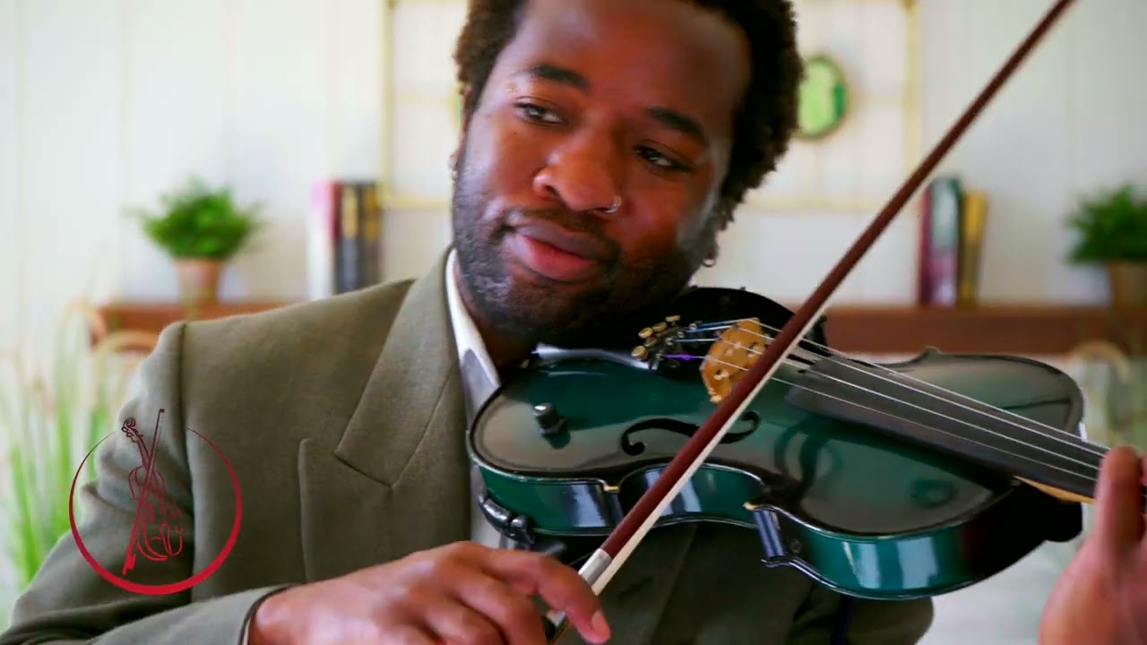 Tim performing Leave the Door Open by Bruno Mars on violin