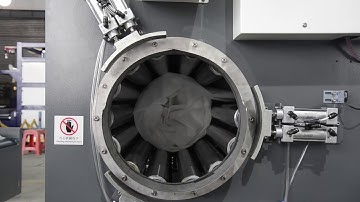 new kind of fully automatic mattress rolling packing machine