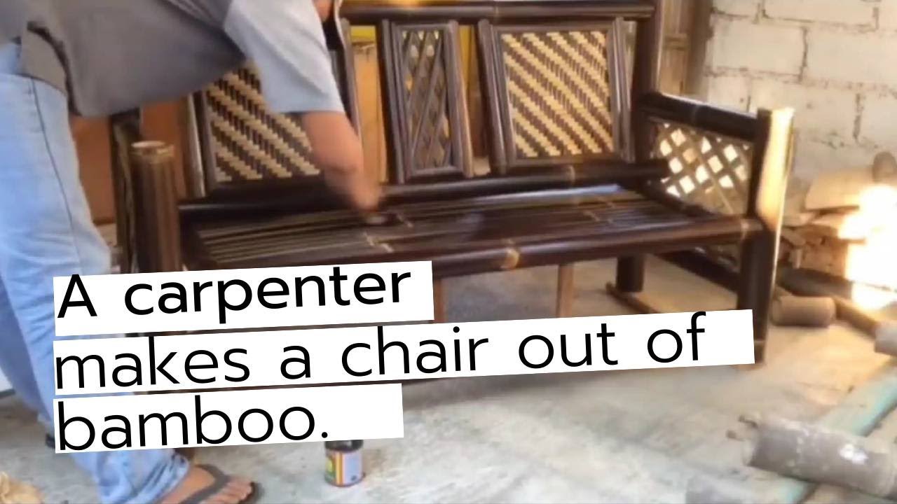 A carpenter makes a chair out of bamboo.