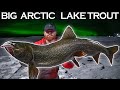 Ice fishing the arctic big lake trout  big blizzards  big northern lights
